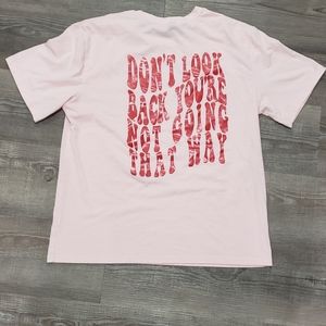 pink tshirt " Don't look back you are not going that way" size small